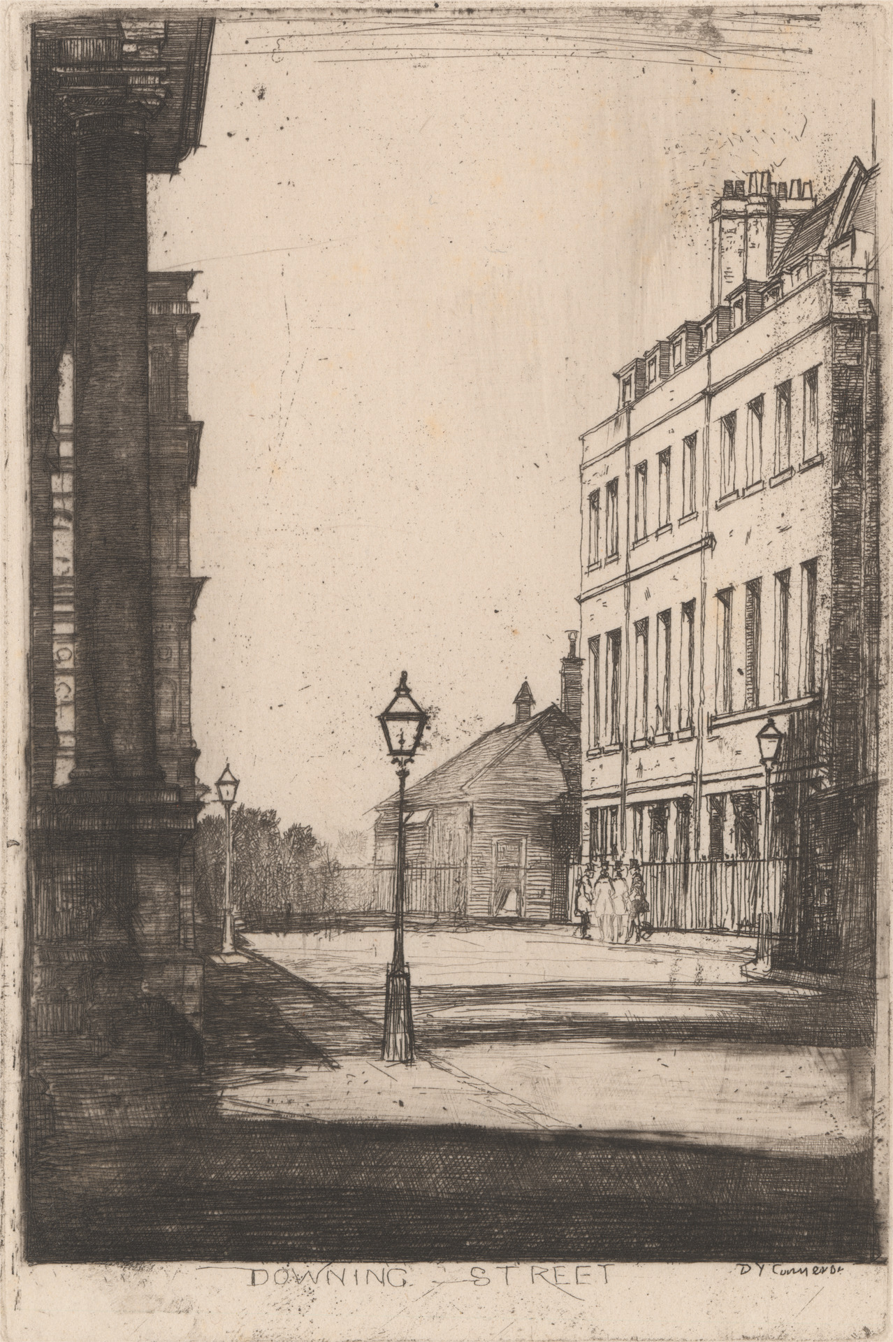 Monochrome image of Downing Street in London with a lamppost and rows of Georgian houses on the right and left